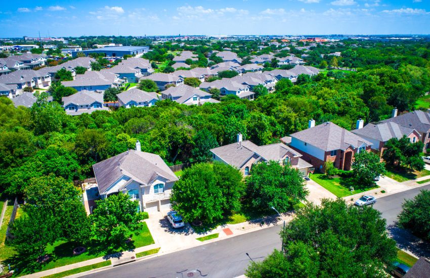 Aerial Drone View Above Austin Texas Suburb Summer Homes For Sale as Real Estate Ramps up in the Capital of Texas Real Estate and Future Development near Wells Branch in North Side of Capital Cities