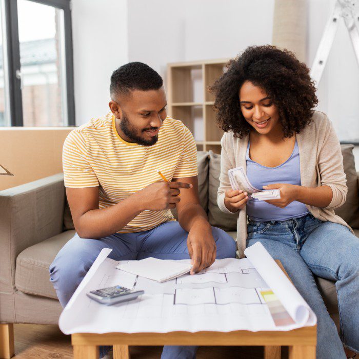 Couple calculating moving costs