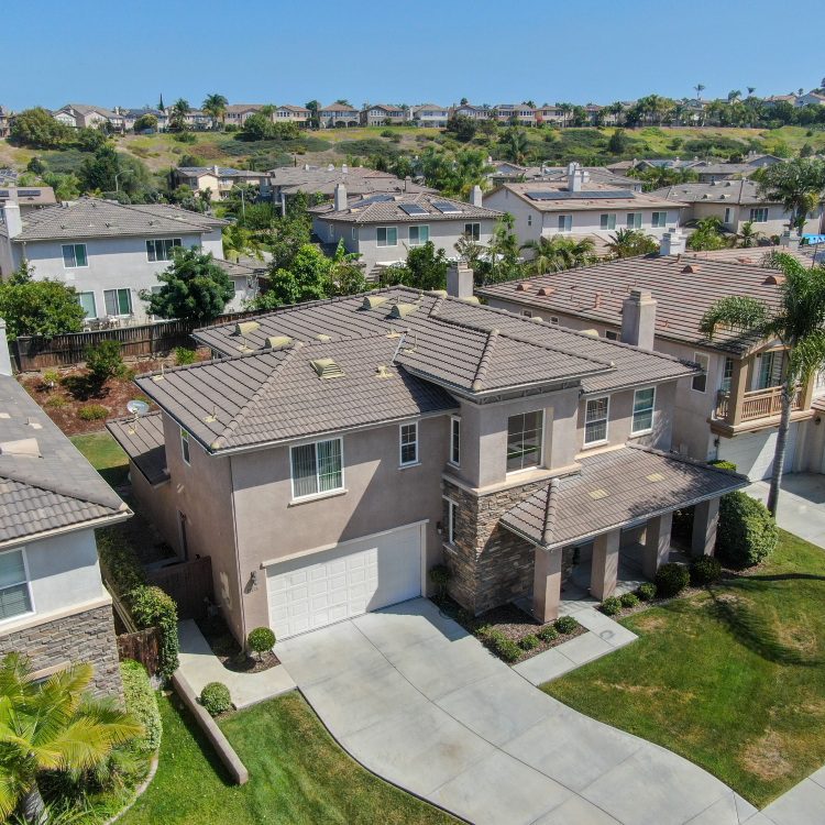 Aerial view suburban neighborhood with big villas next to each other in Black Mountain, San Diego, California, USA. Aerial view of residential modern subdivision luxury house.