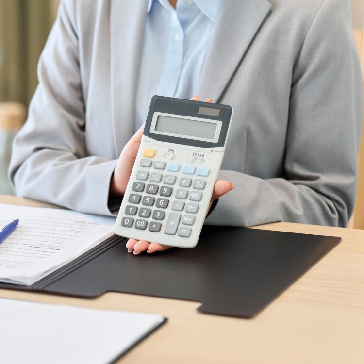 Business woman giving estimates for various products