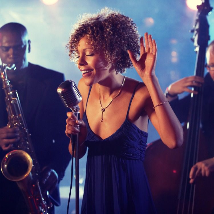 Portrait of Jazz Band playing on Stage