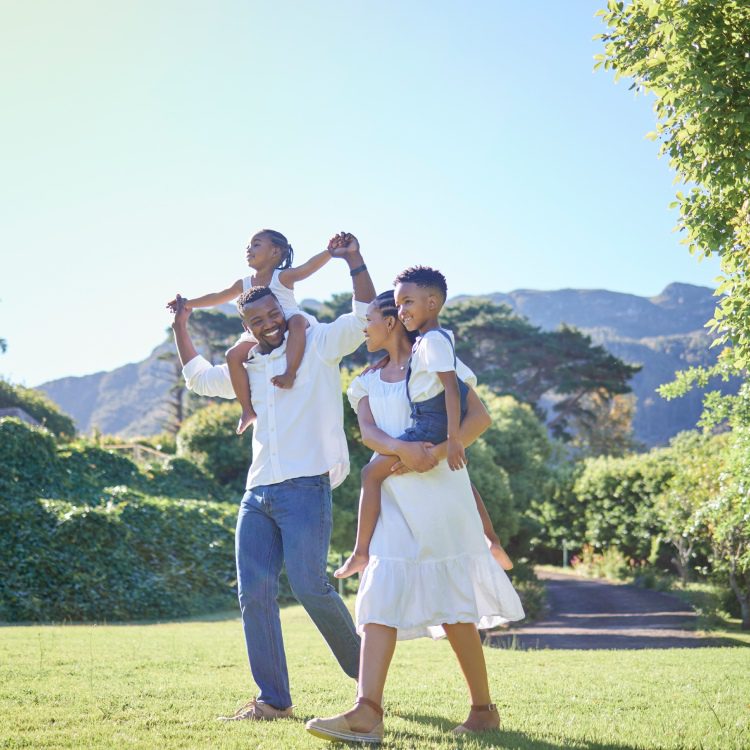 Black people, parents and kids with smile at park for bonding, love and trust with support for child development. Family, couple and playing in garden for care, break and relax for picnic in Atlanta