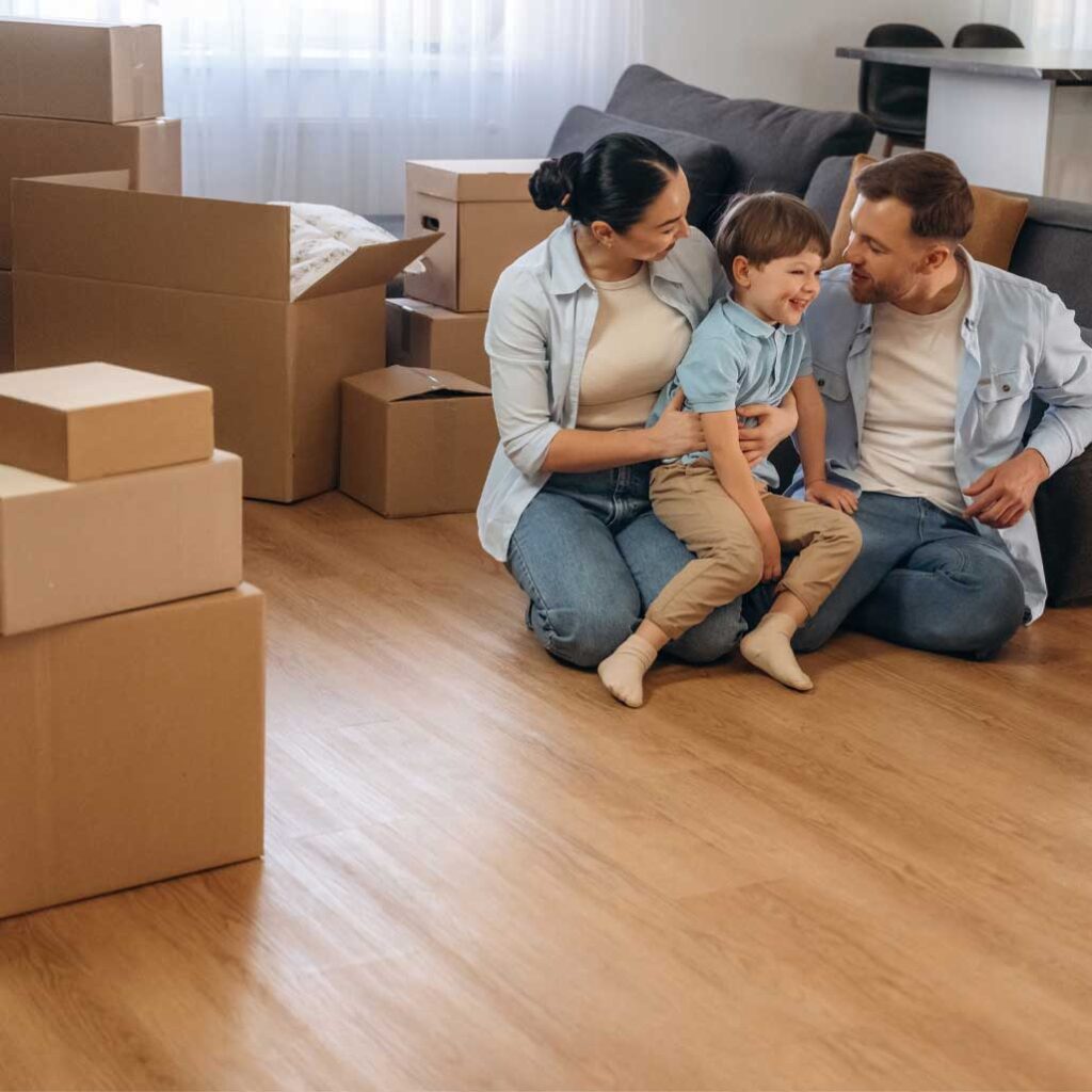Finally some rest. Family of husband, wife and son are moving into new house.