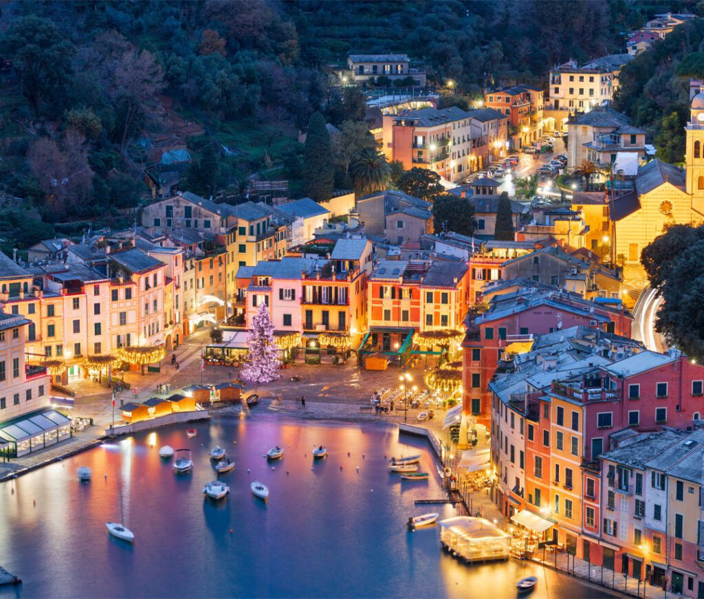 Portofino, Italy fishing village and commune in the Metropolitan City of Genova at dusk.