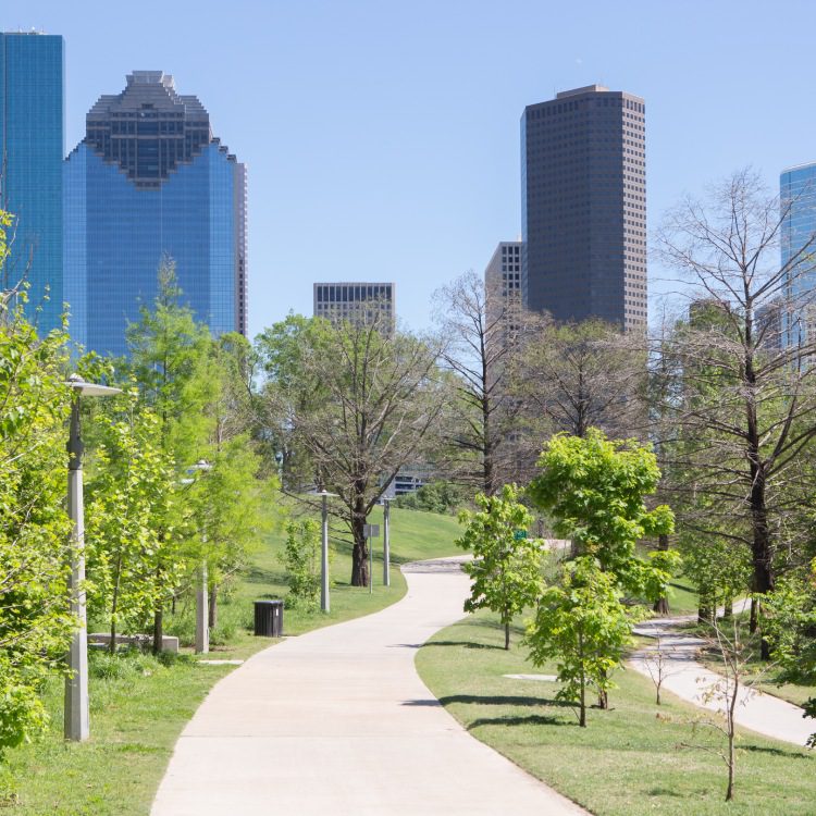 Landscape of Downtown Houston city, in Buffalo Bayou park, Texas with modern building.